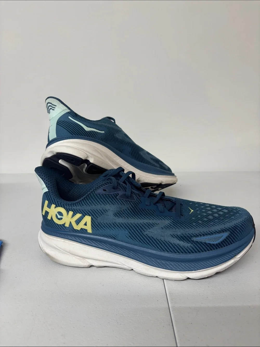 Hoka Blue Running Shoes with Yellow Logo